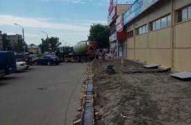 Устройство подпорной стенки и армированного пола ТЦ Азия г.Новоалтайск